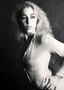 Portrait of the beautiful blonde in studio. b/w