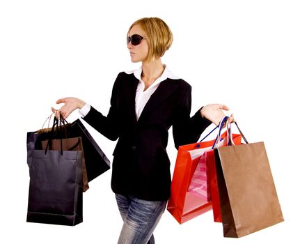 A Swedish blond woman holding a lot of shopping bags