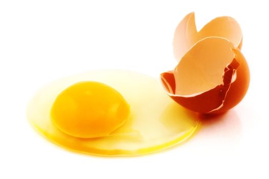 Broken egg on white background with soft focus