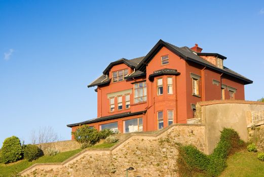 Construction House architecture building with a garden in a residential area.