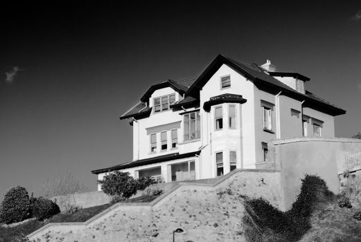 Construction House architecture building with a garden in a residential area.