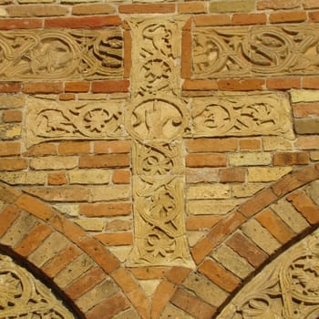 fragment of fasade of Pomposa abbey in Italy
