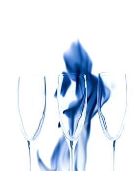 Three Crystal glasses and smoke isolated on black  