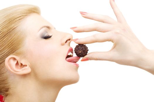 picture of lovely blonde eating chocolate candy