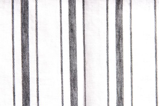 alternating thick and thin stripes on white fabric