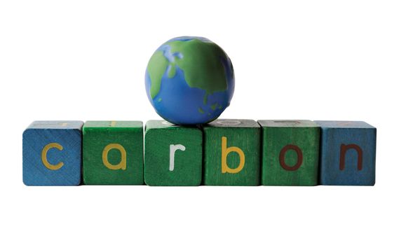 the word 'carbon' with a simple globe on top isolated on white