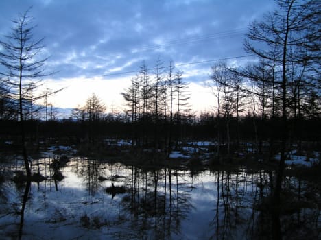 Landscapes of Sakhalin, evening over the river