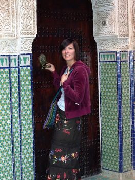 a tourist is knocking on a moroccan door