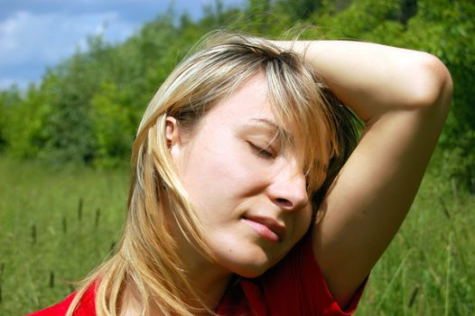 girl with closed eyes enjoying sun