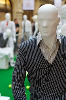 Men`s mannequin inside a clothing store