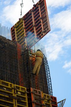 Welder working on metal construction