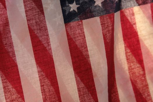 two backlit American flags in a unique view of the stars and stripes