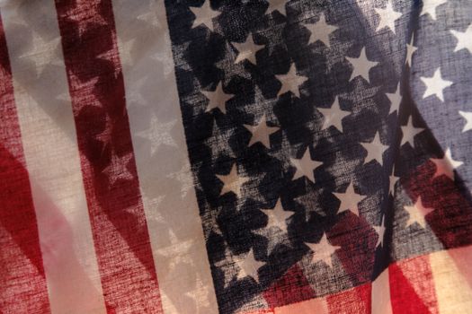 two backlit American flags in a unique view of the stars and stripes