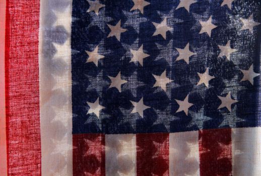 two backlit American flags in a unique view of the stars and stripes