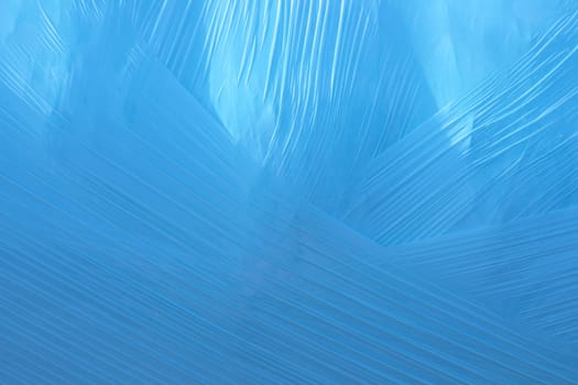 close-up of blue plastic foil used to cover hay and straw bails in England