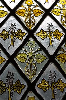 Detail of a stained glass window, kind of frosted, rough glass