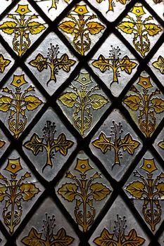 Detail of a stained glass window, kind of frosted, rough glass
