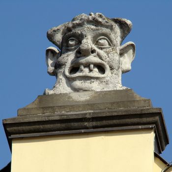 mascaron on Cloth Hall in Main Market Square in Cracow, Poland