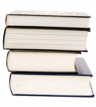 Some thick books on a white background