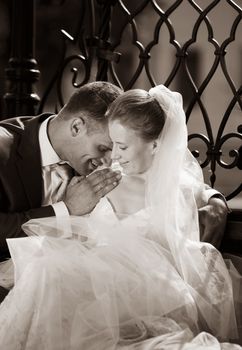 Beautiful the bride and the groom kiss