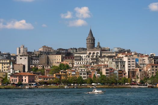 Tower over city view Istanbul with blue river