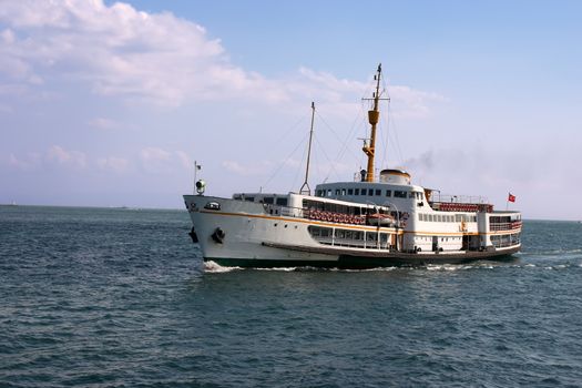 Large motor boat in ocean with turkish flag