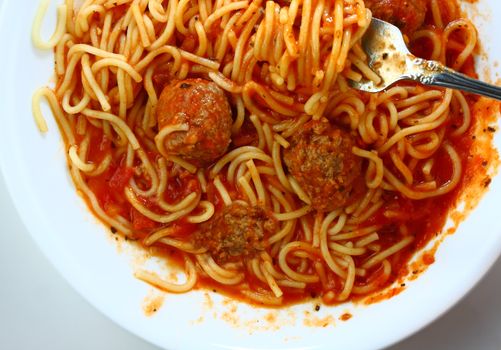 Spaghetti and meatballs with fork