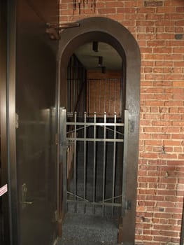 A narrow doorway in an alley of a city 