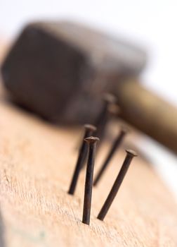 Hammer and vintage nails close up,shallow DOF