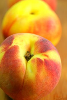 Peaches in vertical composition.