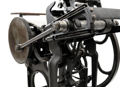 antique black letterpress restored to working condition, isolated on white
