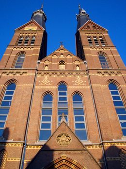Front of Church in Amsterdam with blue sky