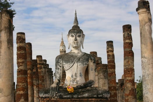 Beautiful buddha statue at the Sukhotai Historical park in Thailand