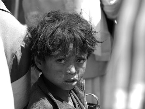 Child in Madagascar looking a bit suspicious at the camera