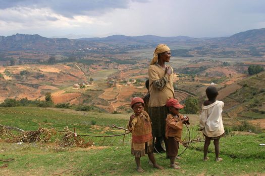 As soon as a bus with tourists stops along the road people show up out of nowhere hoping for a share in the luxury