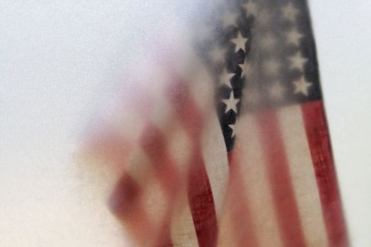 an American flag and textured paper with copy space