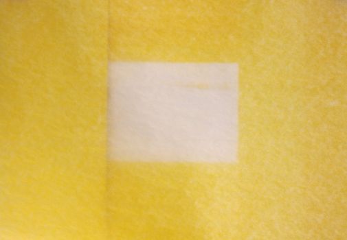 background frame of yellow paper with texture