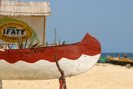 Cano out of the water on a beach in Ifaty