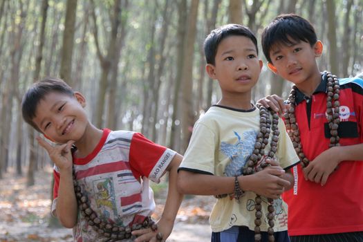 Young children selling tourist junk