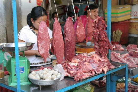 Stall of a butcher in Chinatown, Vietnam