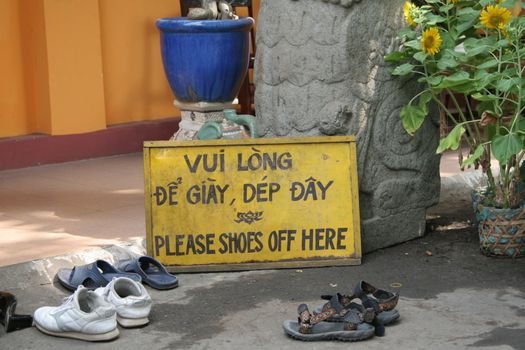 Temple entrance in Vietnam where the shoes have to be taken off before entering the temple