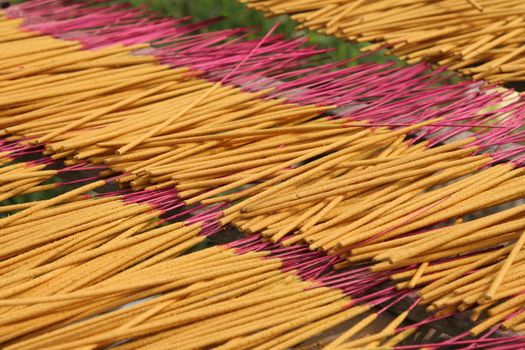 Incense left out to dry in Vietnam