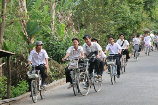 Schoolkids on tiger Island, Mekong Delta vietnam