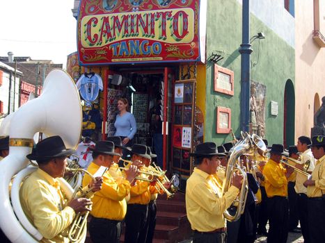 A street band plays in the La Boca district of Buenos Aires, Argentina.