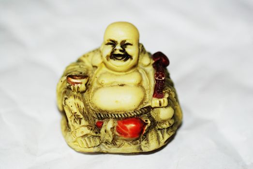 A statue of the laughing Buddha, a symbol of happiness, good luck and plenitude.