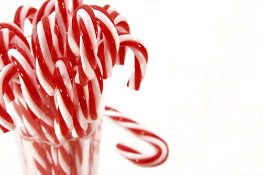 Lots of candy canes on isolated background