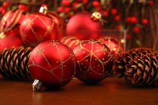 Red Christmas ball with pine cones