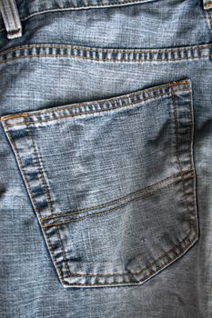 macro shot of the back pocket of jeans
