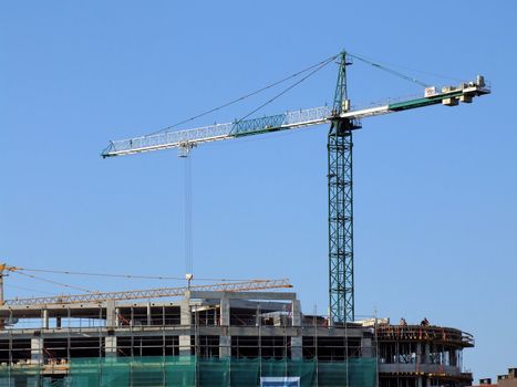 A under construction house on a background of the blue sky