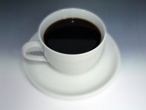 Black coffee in a white cup